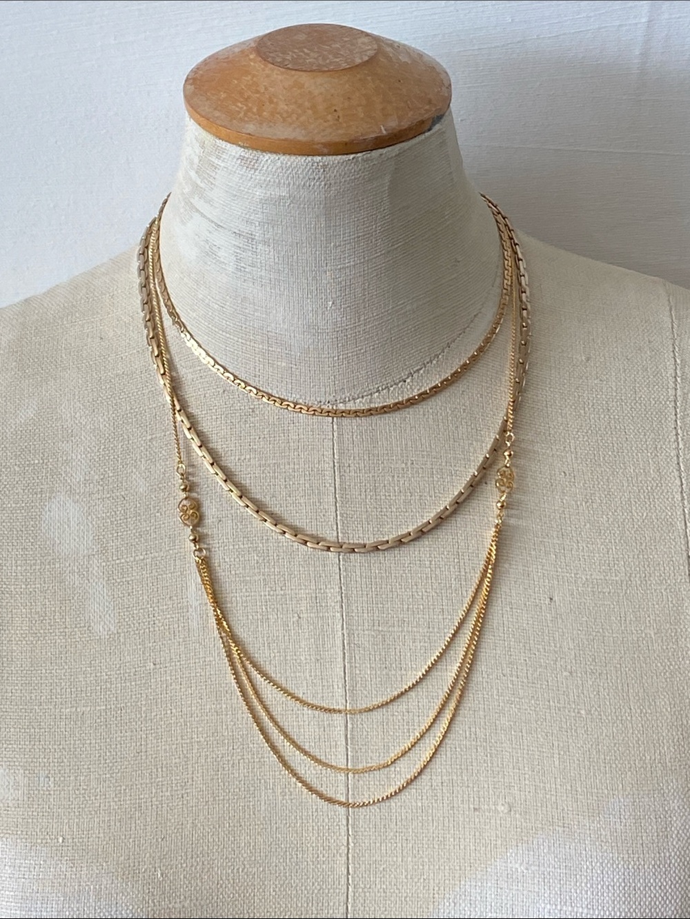3 gold tone, necklaces for layering. Artistry